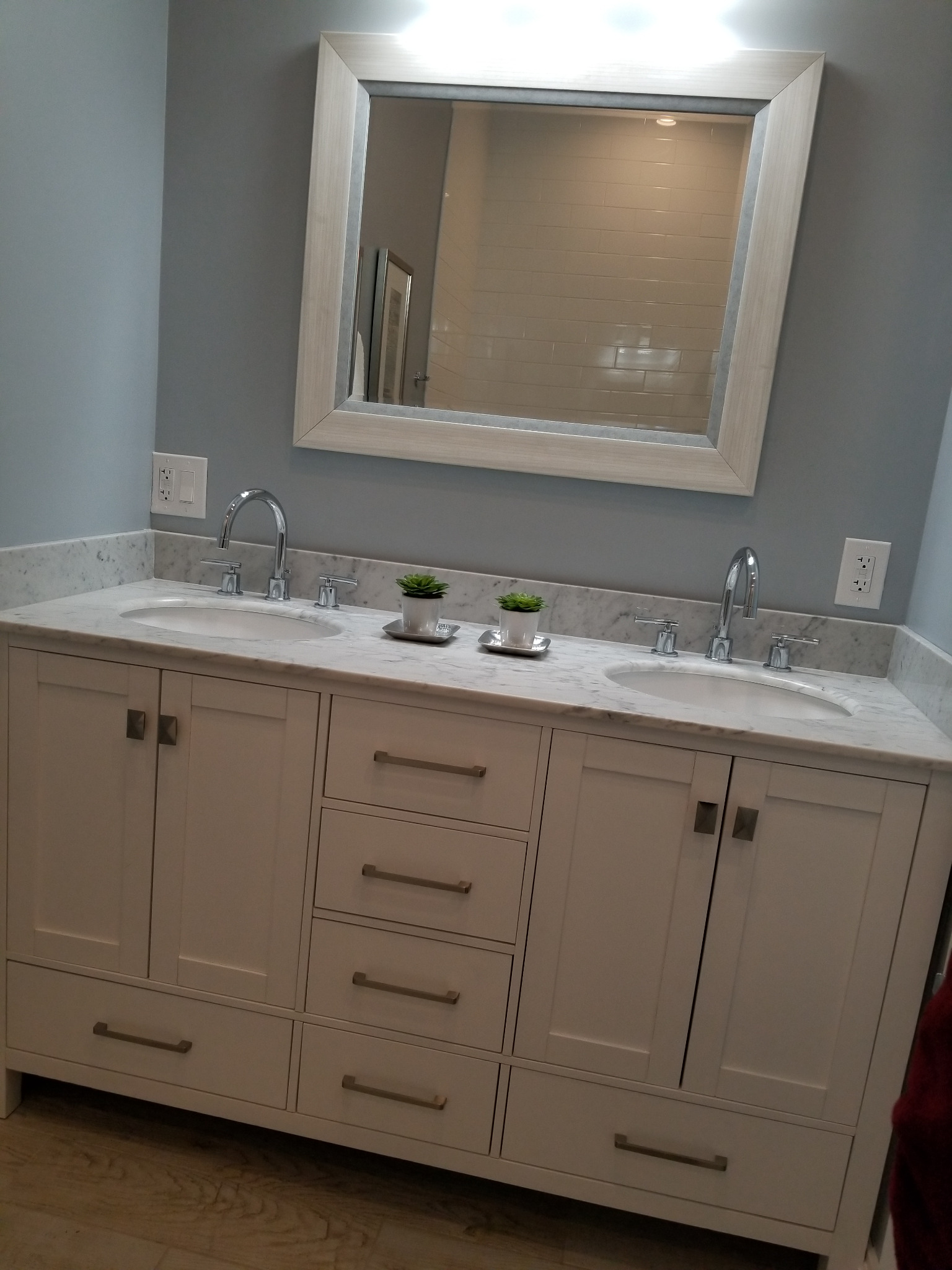Bathroom vanity with mirror lighting and GFCI outlets
